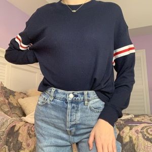 navy blue, white, and red soft sweater